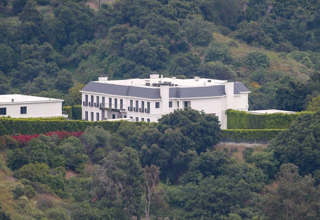 The Beverly Hills estate owned by Ben Affleck and Jennifer Lopez, here pictured on June 7, appeared on a market listing Thursday. 