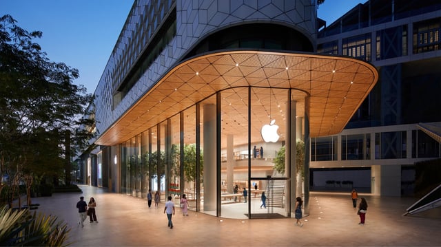 Apple BKC features huge glass walls and a timber ceiling.