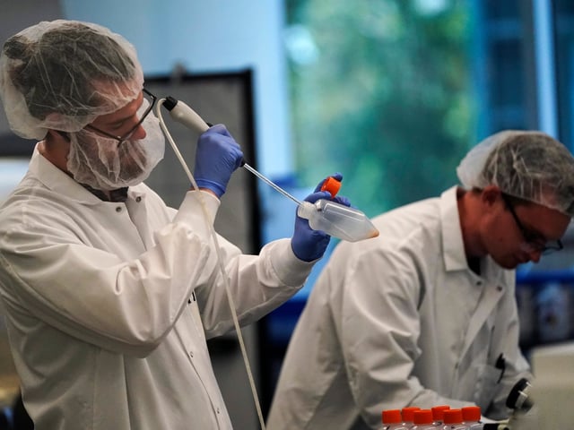Scientists work in a bioprocess lab at Eat Just in Alameda, Calif., Wednesday, June 14, 2023. The Agriculture Department issued final approvals Wednesday, June 21 to California firms Upside Foods and Good Meat to sell the products, known as “lab grown” or “cultivated” meat. (AP Photo/Jeff Chiu)