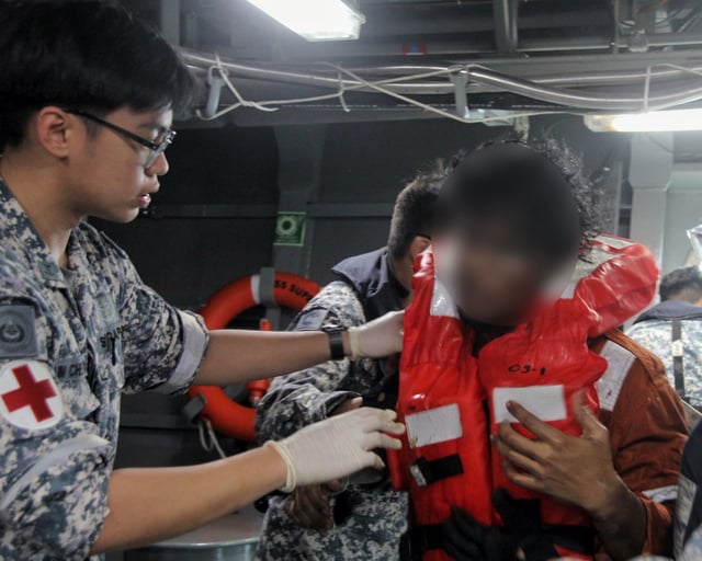 Medics aboard RSS Supreme providing medical assistance to rescued crew after oil tankers Hafnia Nile and Ceres I caught fire in the Singapore Strait. Photo: Singapore Navy