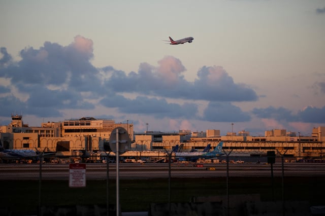 An American Airlines plane takes off from Miami International Airport in Miami on January 2, 2023.