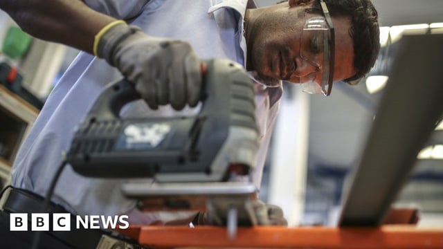 An employee uses a jigsaw to cut a plastic pipe at the Grundfos AS factory in Chennai, India, on Monday, Nov. 27, 2017.