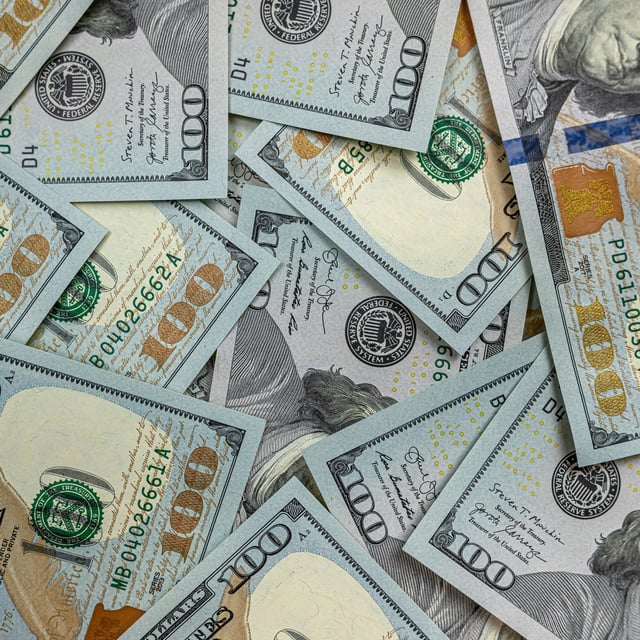 Stock photo of new US $100 bills. A financial planner is going viral for sharing the advice he recently provided to an elderly woman related to how she might handle setting up her estate.