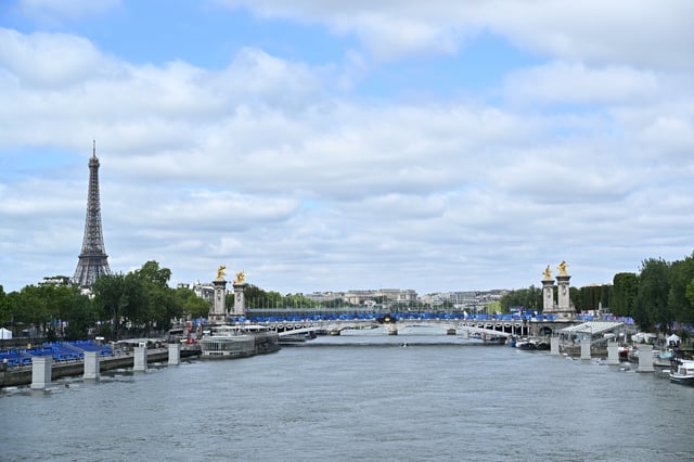 The Eiffel Tower and Seine river are seen before the opening of Paris 2024 Olympics on July 22, 2024 in Paris, France.