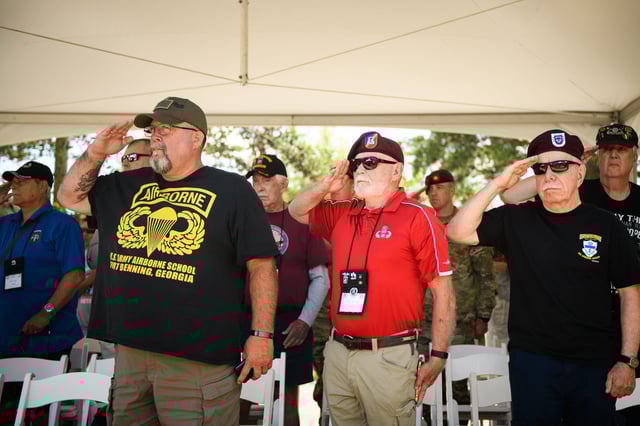 Veterans salute during the National Anthem at the 82nd Airborne Division’s Memorial ceremony on Tuesday, May 21, 2024, on Fort Liberty. Project 2025 includes a plan for reforming the Department of Veterans Affairs.
