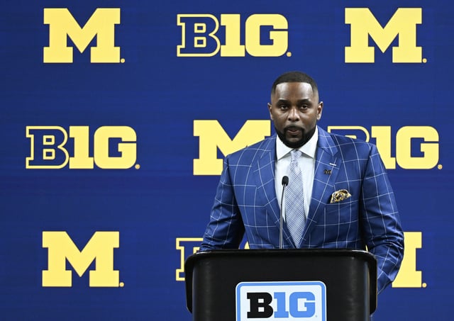 Michigan Wolverines head coach Sherrone Moore speaks to the media during Big Ten media days at Lucas Oil Stadium in Indianapolis on Thursday, July 25, 2024.