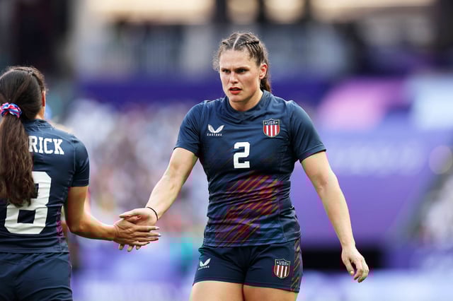 Ilona Maher of Team United States celebrates with teammate Alex Sedrick during the Women's Pool C match between United States and Japan on day two of the Olympic Games Paris 2024 at Stade de France on July 28, 2024 in Paris, France.