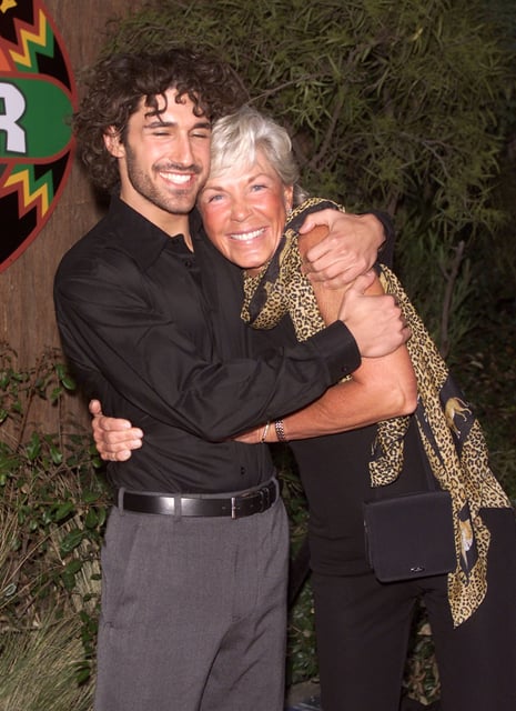 Kim Johnson, who placed second on "Survivor: Africa" in its 2001-2002 airing, has reportedly died, according to her children. She is seen here in 2002 with season winner Ethan Zohn.