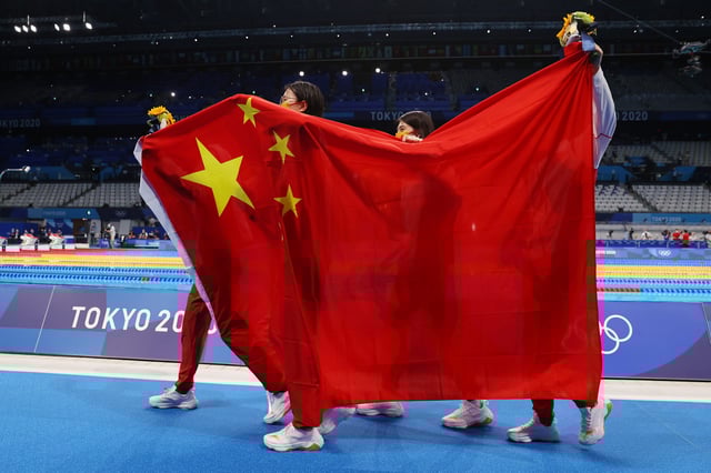 China gold medallists Yang Junxuan, Tang Muhan, Zhang Yufei and Li Bingjie celebrate at the Tokyo Olympics.