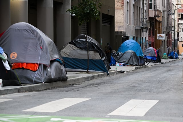 Homeless encampment is seen on a sidewalk in San Francisco, California, United States in 2023.