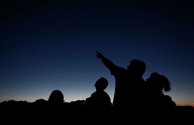 People gather for a stargazing party at Boerne City Lake sponsored by the city on July 21, 2017. In July 2024, stargazers in El Paso spotted fireballs in the night sky.