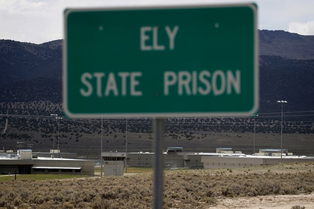 A sign marks the entrance to Ely State Prison near Ely, Nev., on July 11, 2018. 