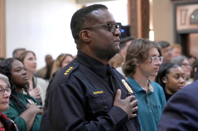 Milwaukee Police Chief Jeffrey Norman during the National Anthem at Mayor Cavalier Johnson’s inauguration in the City Hall Rotunda at Milwaukee City Hall in Milwaukee on Tuesday, April 16, 2024.