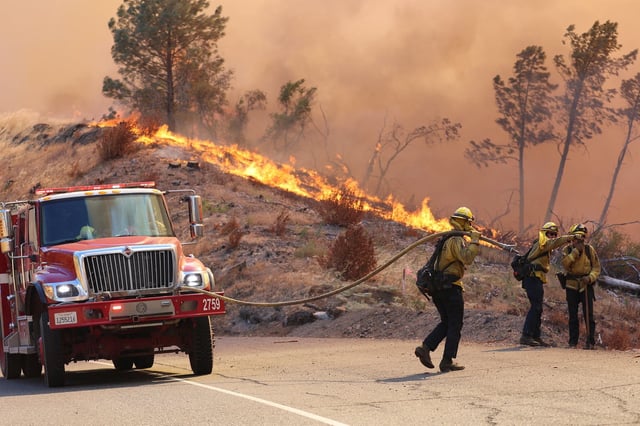 Firefighters work to control the Park Fire, in this picture released on July 31, 2024.