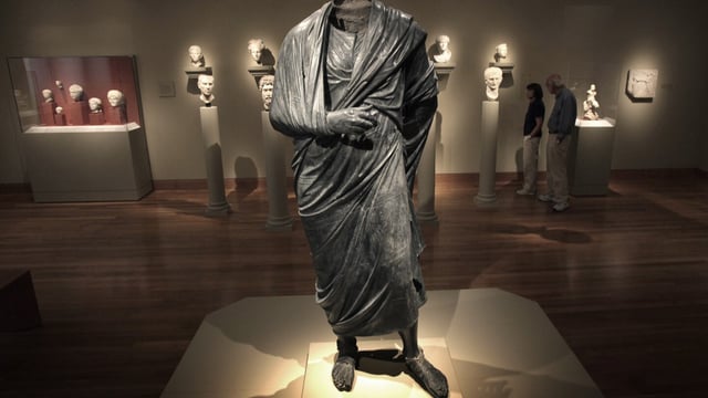 FILE — The Emperor as Philosopher," a Roman-era statue, thought to represent Marcus Aurelius, stands in a gallery at the Cleveland Museum of Art in Cleveland, Ohio, June 25, 2010. A warrant signed by a judge in Manhattan, Aug. 14, 2023, ordered the seizure of the statue, from the Cleveland Museum of Art by New York authorities investigating antiquities looted from Turkey. (AP Photo/Amy Sancetta, File)