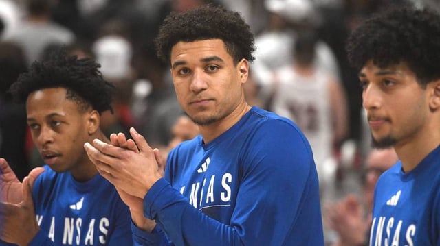 Kansas’ guard Kevin McCullar Jr. (15) claps during warmups before the Big 12 basketball game against Texas Tech, Monday, Feb. 12, 2024, at United Supermarkets Arena.