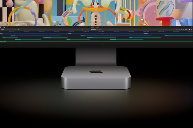 The current Mac Mini already sits comfortably on the foot of the Apple Studio Display. Image: Apple