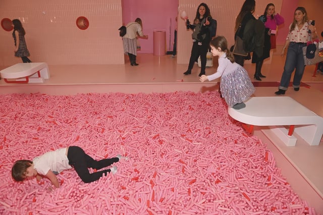 Young guests enjoy activities during the a celebration at the Museum of Ice Cream on Feb. 06. A lawsuit, filed by someone who visited the museum the following month, alleges the sprinkle pool is unsafe.