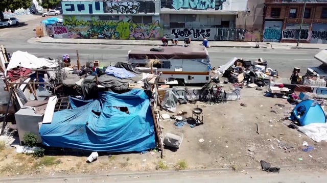 Drone footage shows a homeless encampment in Oakland, California. As California cities decide how to handle new state orders on homeless encampments, San Francisco says it will be clearing process.