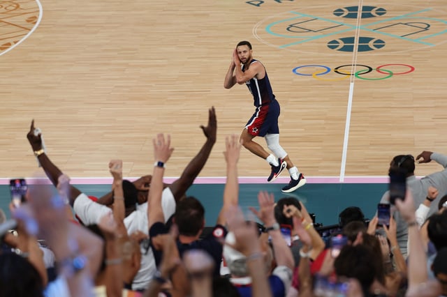 PARIS, FRANCE - AUGUST 10: Stephen Curry #4 of Team United States reacts after a three point basket during the Men's Gold Medal game between Team France and Team United States on day fifteen of the Olympic Games Paris 2024 at Bercy Arena on August 10, 2024 in Paris, France. (Photo by Jamie Squire/Getty Images)