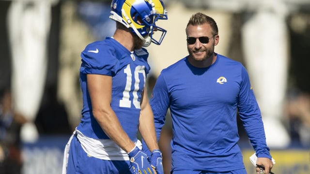 Los Angeles Rams wide receiver Cooper Kupp (10) talks to head coach Sean McVay at the NFL football team's training camp, Saturday, July 29, 2023, in Irvine, Calif. (AP Photo/Kyusung Gong)