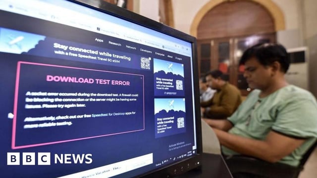A screen shows a download error amid slow speed and disruptions of internet services in Karachi, Pakistan