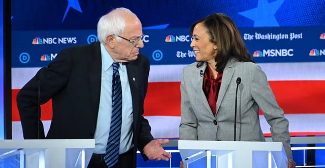 Sen. Bernie Sanders and then-California Sen. Kamala Harris at a Democrat presidential primary debate on Nov. 20, 2019. (Saul Loeb/AFP/Getty Images)