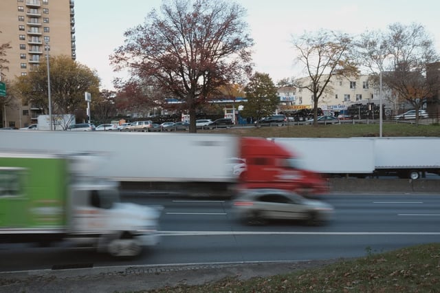 Cars and trucks move along the Cross Bronx Expressway in 2021.