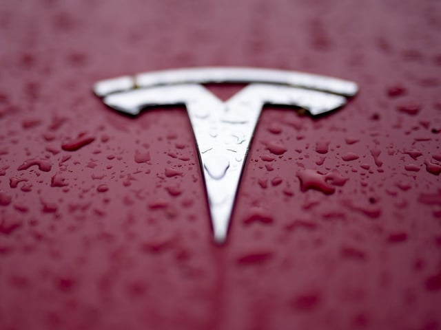 FILE - A Tesla logo is shown on Feb. 27, 2024, in Charlotte, N.C.