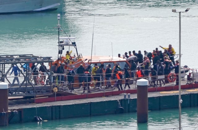 At least 12 people died when a boat capsized off the English Channel, on September 3. Authorities rescued 65 people, who were brought to Dover, Kent, southeastern England.