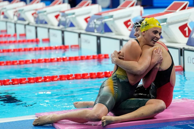 Gold medalist Leary, left, and American silver medalist Christie Raleigh-Crossley embrace each other after the women's 100m freestyle S9 on Wednesday.