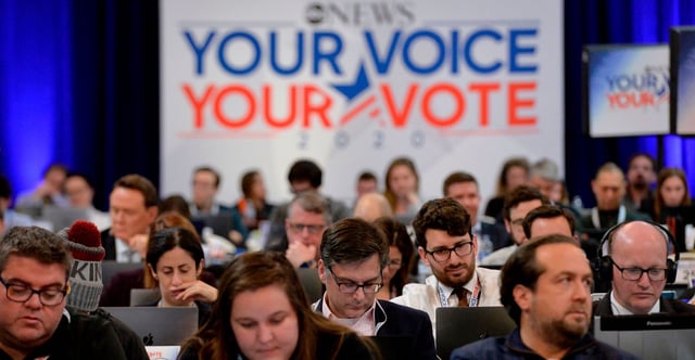Journalists work at a 2020 Democrat primary debate co-hosted by ABC News in New Hampshire. (Photo: Joseph Prezioso/AFP via Getty Images)