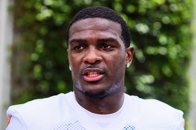 Jul 24, 2024; Miami Gardens, FL, USA; Miami Dolphins running back De'Von Achane (28) talks to reporters during training camp at Baptist Health Training Complex. Mandatory Credit: Sam Navarro-USA TODAY Sports/File Photo