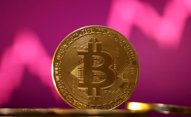 Representation of the bitcoin cryptocurrency and a price chart are seen in this illustration taken October 24, 2023. REUTERS/Dado Ruvic/Illustration/File Photo