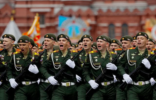 Russian service members march in columns during a military parade on Victory Day, which marks the 79th anniversary of the victory over Nazi Germany in World War Two, in Red Square in Moscow, Russia, May 9, 2024. REUTERS/Evgenia Novozhenina