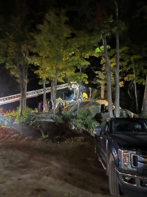 Firefighters worked overnight to save the 11-year-old boy who was trapped between boulders.