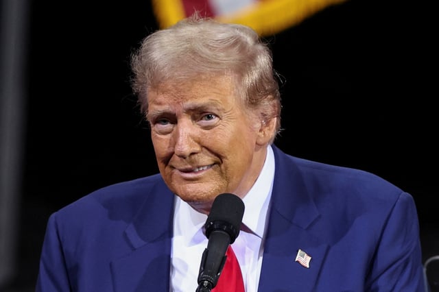 Republican presidential nominee and former U.S. President Donald Trump looks on as he speaks during a campaign rally in Tucson, Arizona, U.S. September 12, 2024.  REUTERS/Mike Blake/File Photo