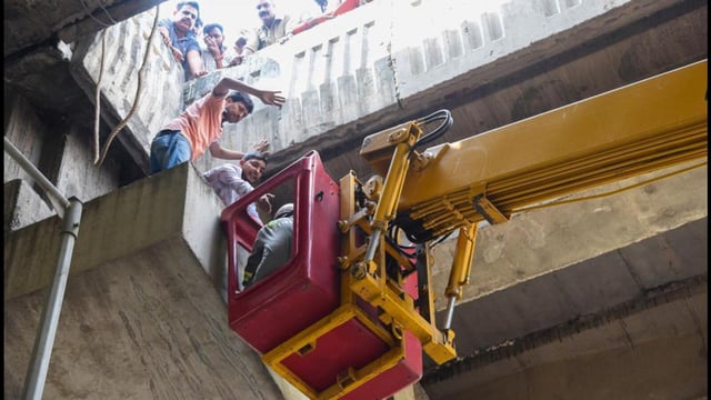 A fire tender’s crane being used to rescue the victim at the scene. (HT Photo)