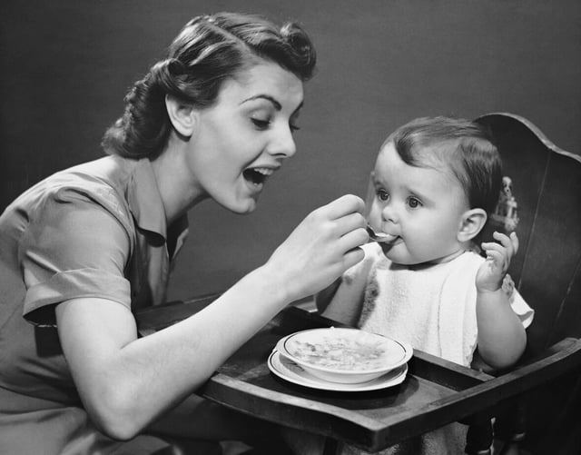 mom feeding baby