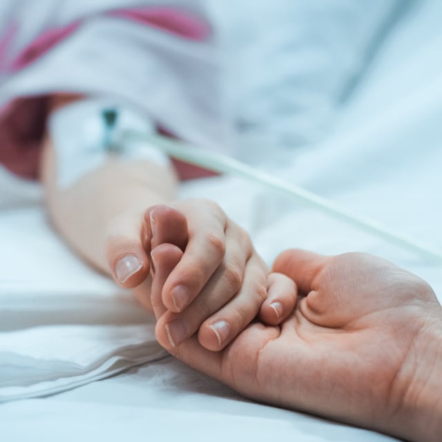 Photo of a child in hospital. Children are particularly at risk of more severe symptoms from EV-D68.